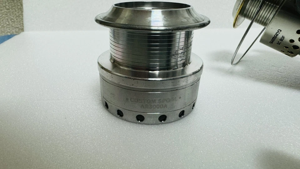 Shimano 01 Stella AR 3000 con juego de carretes de repuesto Studio Ocean Mark - Imagen 3 de 4