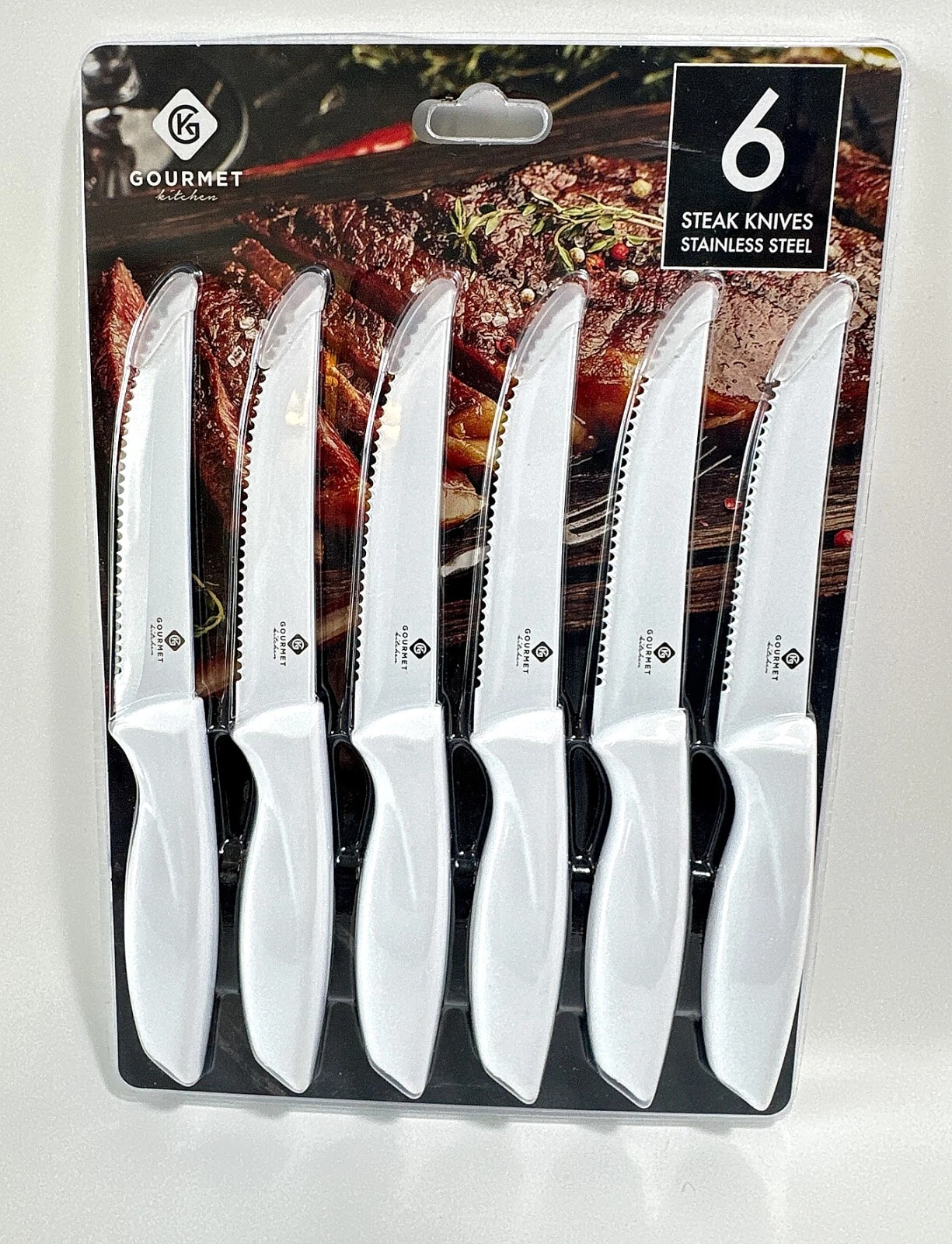 Gourmet Kitchen 6pc Stainless Serrated Edge Steak Knife Set White Handle DW Safe
Opens in a new wind