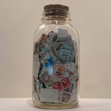 Jar of International Stamps Italy Germany Korea Canada England Australia Mixed