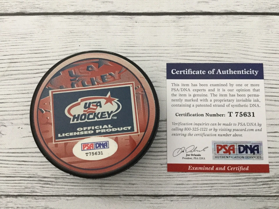 Disco de hockey firmado por Keith Yandle equipo de EE. UU. CERTIFICADO DE AUTENTICIDAD PSA/DNA b Foto 2 de 3