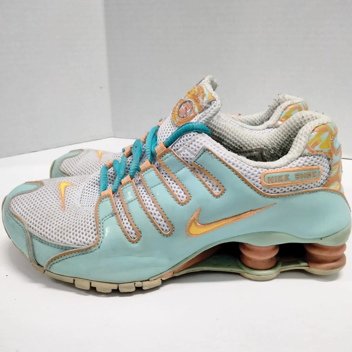 Orange nike hotsell tennis shoes