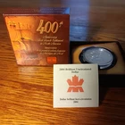 2004 Canadian 400th Anv. First French Settlement BU Silver Dollar