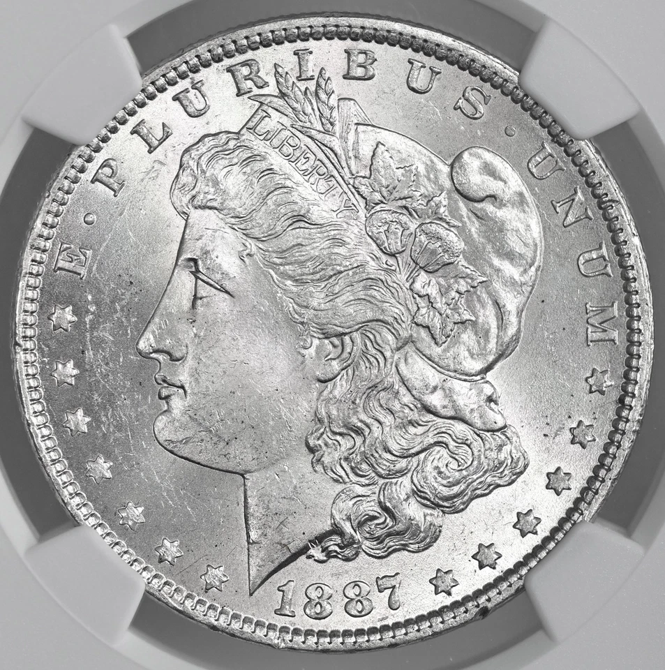 СЕРЕБРЯНЫЙ МОРГАНОВСКИЙ ДОЛЛАР 1887-P $1 «МОНЕТНЫЙ ДВОР ФИЛАДЕЛЬФИИ» NGC MS63 #86795097-025 - Изображение 2 из 4