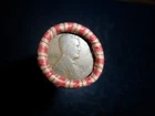 ROLL OF UNSEARCHED WHEAT PENNIES WITH 1916S AND A 1945 PENNY ON THE ENDS.