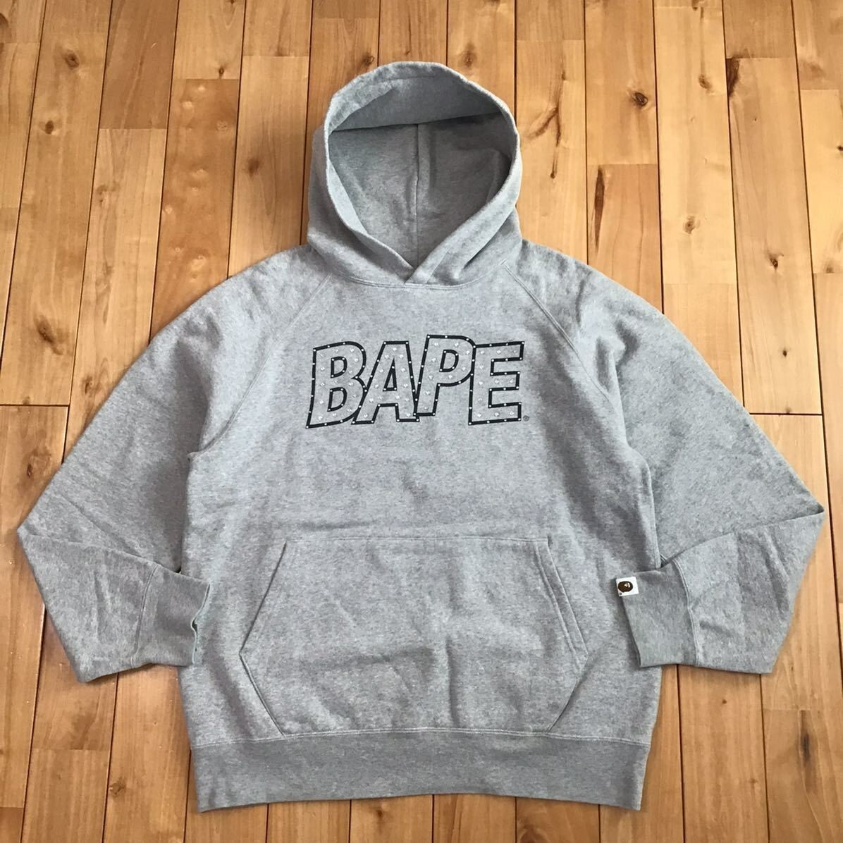 BAPE スーパーマンロゴ スワロフスキー NIGO期 パーカー 迷彩 フーディ A BATHING APE（アベイシングエイプ）の「BAPE X DC SUPERMAN PULLOVER