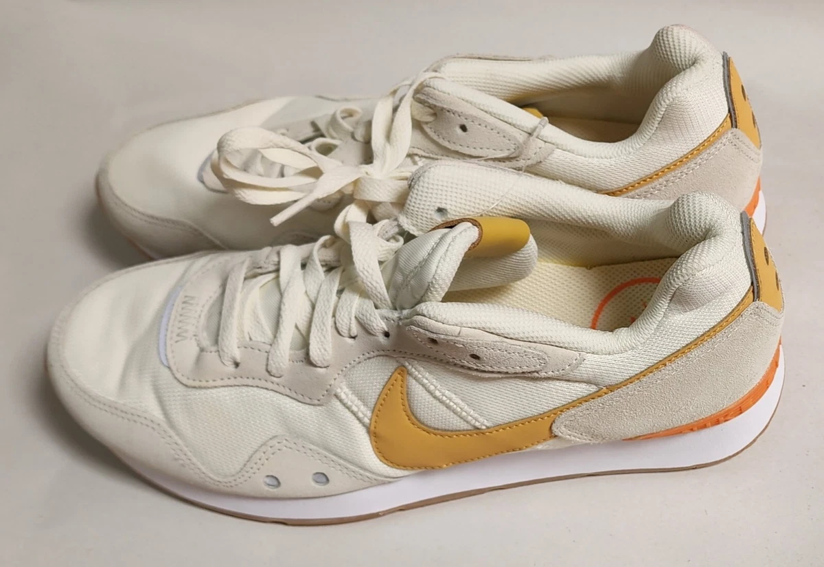 Nike beige hotsell orange