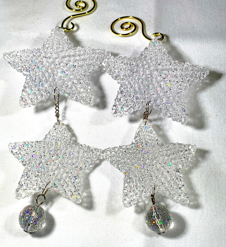 2 SETS OF TWO TEXTURED CLEAR GLASS STAR HANGING ORNAMENTS~2 3/4" & 2 1/8" ACROSS