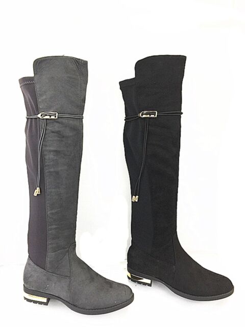 black shin high boots