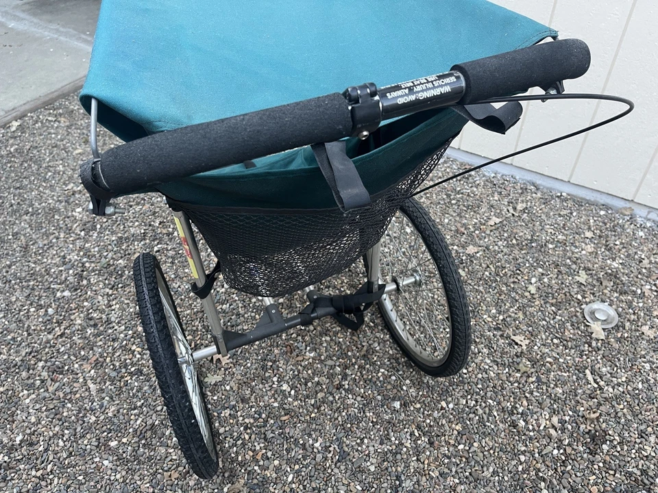 Cochecito de bebé Jogger - Plegable con cestas traseras e inferiores, freno y correa de seguridad - Foto 4 de 4