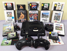 Sega Mega Drive console 2 controllers & games bundle full set up