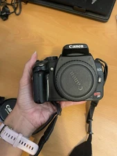 Canon EOS Rebel XT Digital SLR Camera Body 8.0 MP with Battery And TWO lenses