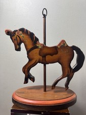 This is a vintage hand painted wooden carousel horse figure.