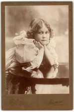 Cabinet Card Circa 1890s Young Girl In Ruffled Dress Leaning On Table Unmarked