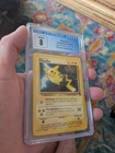 CGC 8 NM/Mint+ 1999 Pokemon Black Star Promo Pikachu 4 WB Mewtwo Strikes Back