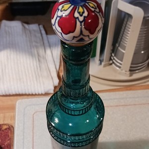 Green Glass Decorative Bottle with Floral Multicolor Stopper