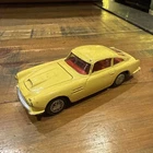Corgi Toys Aston Martin DB4 218 cream yellow Diecast model car D.B.4. vintage
