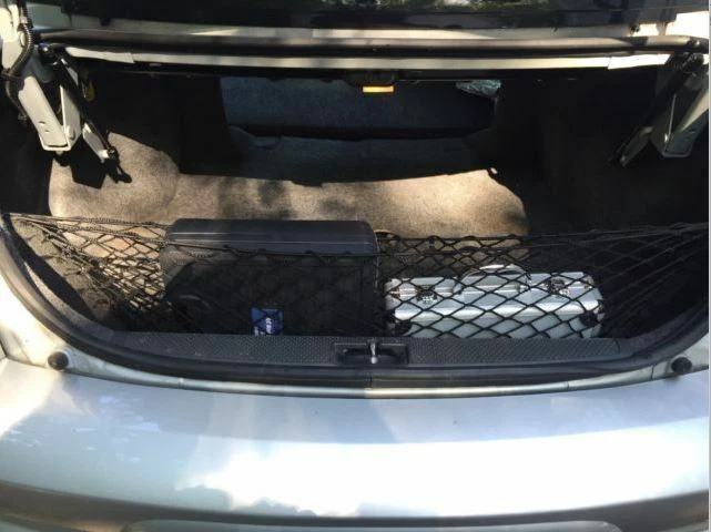 Red de carga organizadora de malla estilo sobre maletero para Chevrolet Cavalier 1995-2005 Foto 2 de 4