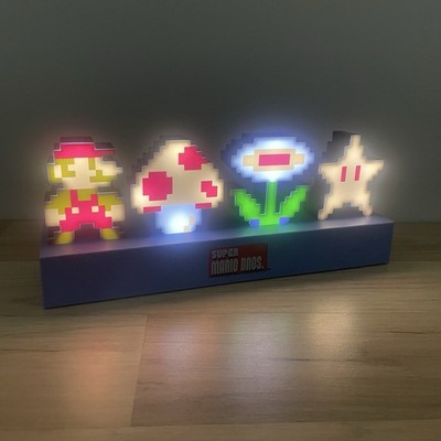 Super Mario Bros 64 Bit Icons Light By Paladone Mario Mushroom Flower Star