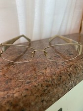 vintage women's eyeglass gold frames very unique and stylish