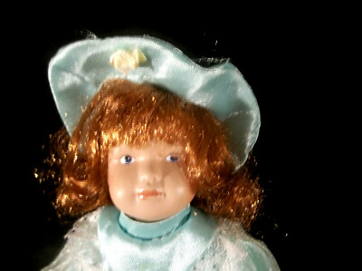 Dandee 7'' Porcelain Redheaded Blue Eyed Doll with Light Green Dress and Hat