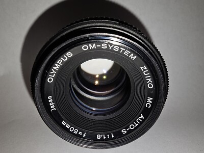 Objectifs photographiques anciens Olympus