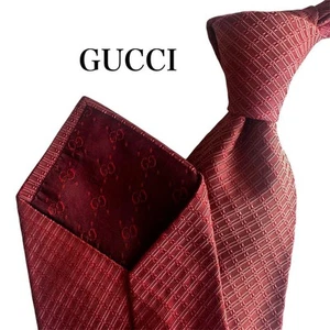 Cravate rouge GUCCI motif géométrique soie luxe