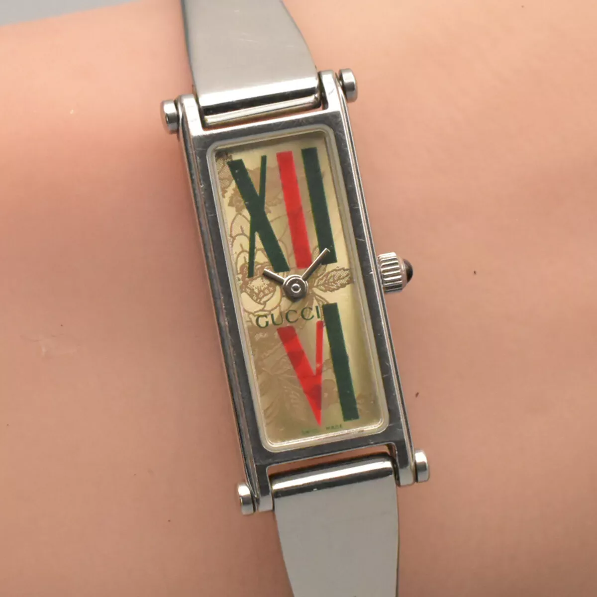 Montre femme vintage GUCCI 1500L cadran fleurs quartz du Japon