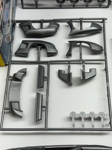 MPC Pontiac Fiero 2-Seat Sport Coupe Scale 1:25 Model Kit 6309 ETRL - Picture 11 of 16