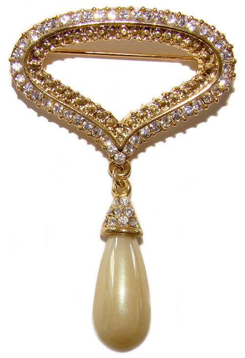 Broche originale goutte d'eau en strass à porter sur un manteau ou une robe de soirée