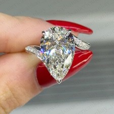 3.98 TCW Pear Cut VVS1 Moissanite Bypass Engagement Ring 14K White Gold Plated