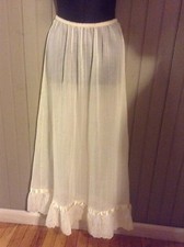 Vintage Flair size small cream 1/2 slip with ribbon  ruffles on hem ilgwu tag