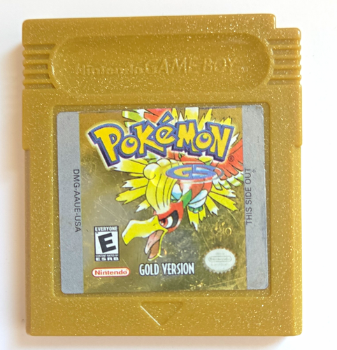 Gold Pristine CIB Game Boy with Pokémon logo, yellow border, and Nintendo, Sony, and ESRB logos on cartridge.