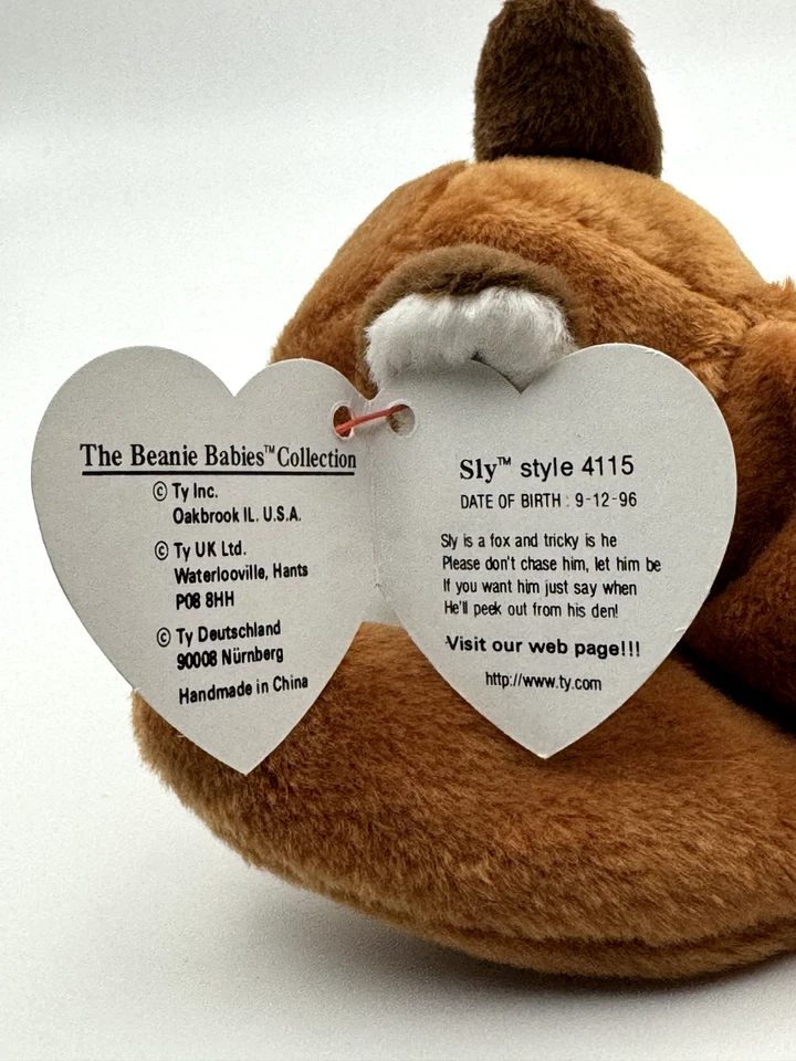 Gorro vintage 1996 TY “Sly the Fox” bebé vientre marrón retirado Foto 3 de 4