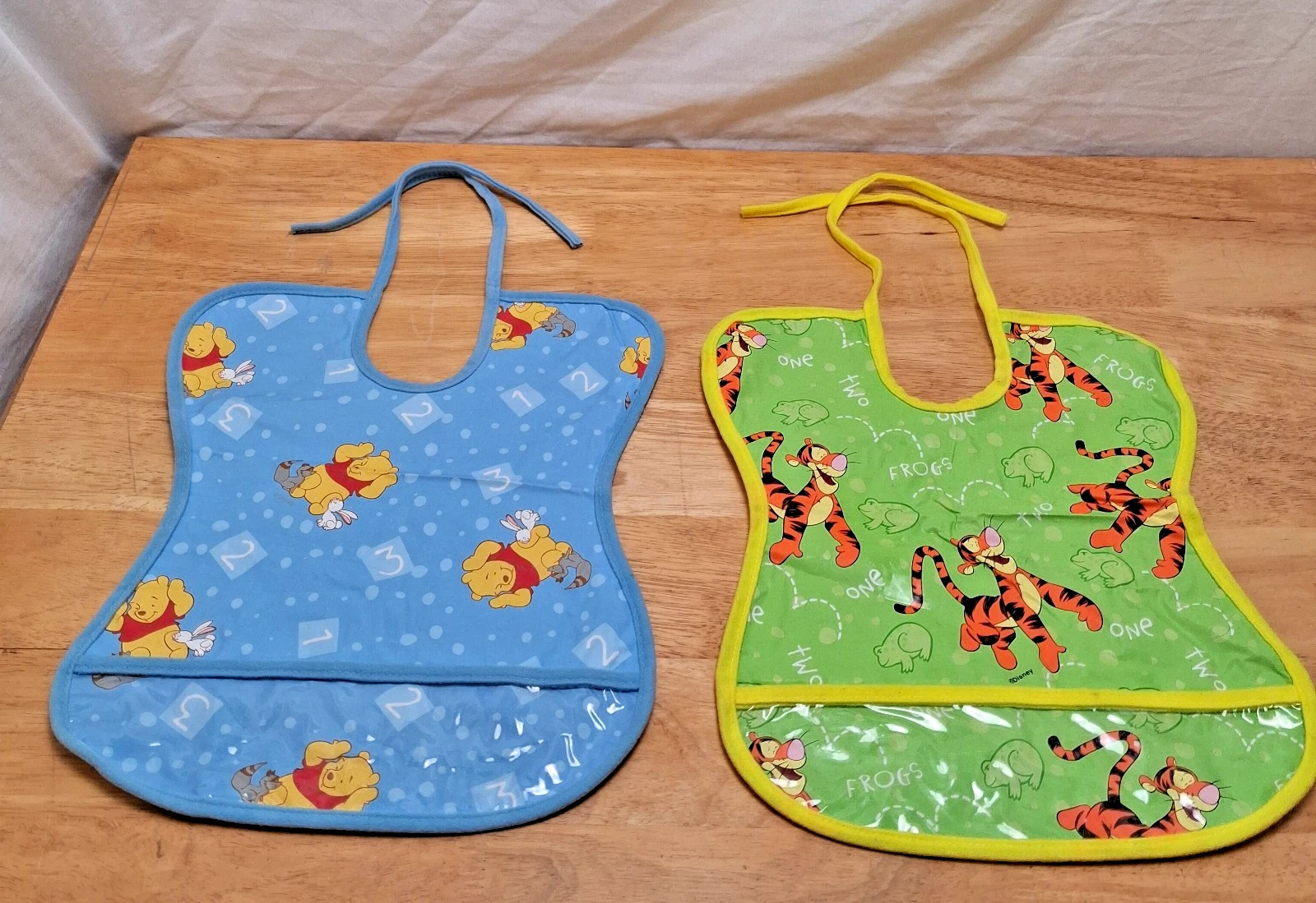 2 Vintage The First Years Winnie the Pooh Tigger Tie Bib Vinyl Food Catcher
Opens in a new window or