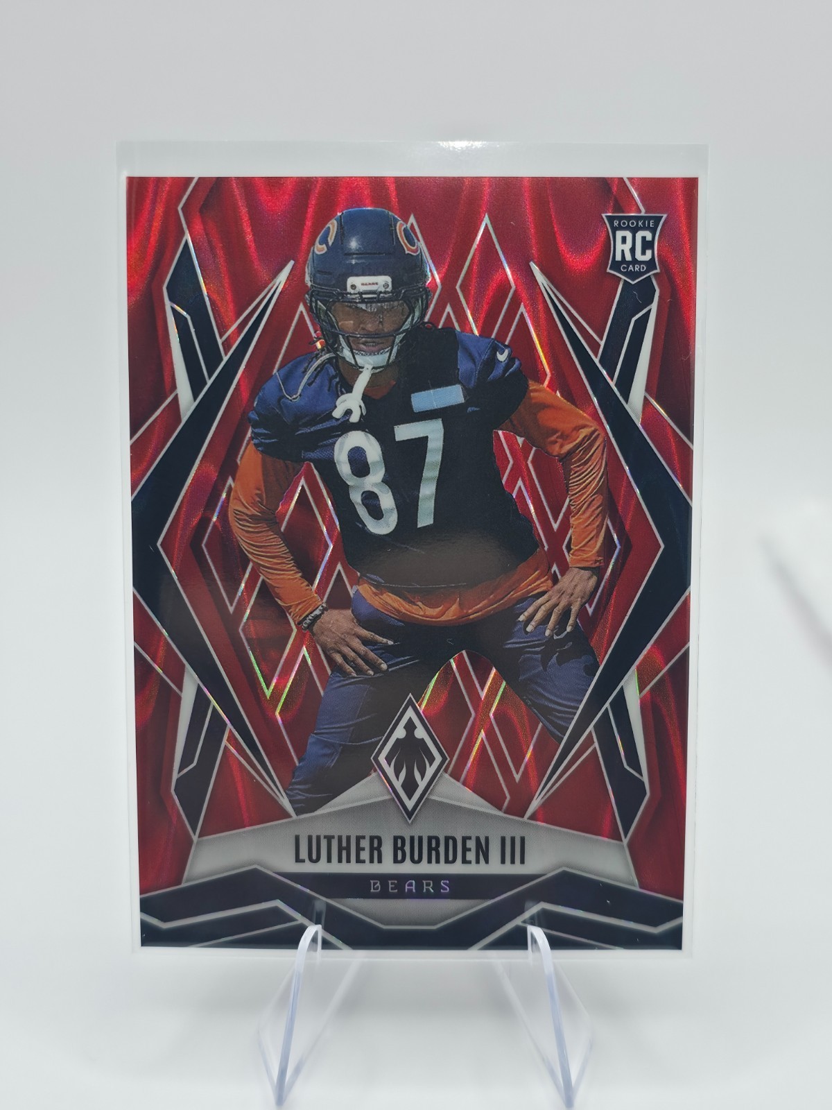 2025 Panini Phoenix Luther Burden III Red Phoenix /99 #196 (RC) Chicago Bears