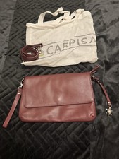 Borsa a tracolla pochette Carpisa in pelle bordeaux. Nuovo senza etichette. 