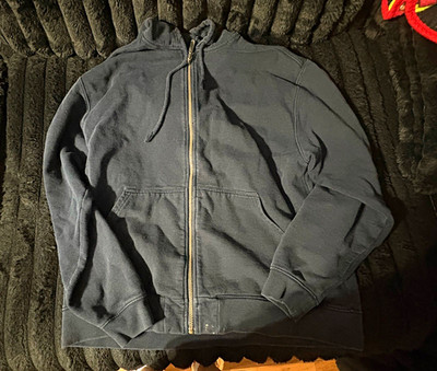 L.L bean zip up does have a small white patch and it is blue in person