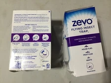 Zevo Flying Insect Trap LOT  (12 Plug-In devices + 12 Cartridges)