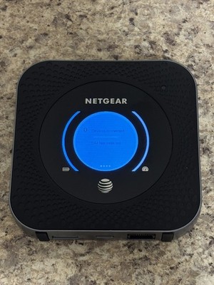 NETGEAR Nighthawk MR1100 Wireless Wi-Fi Hotspot Modem and MIMO antenna