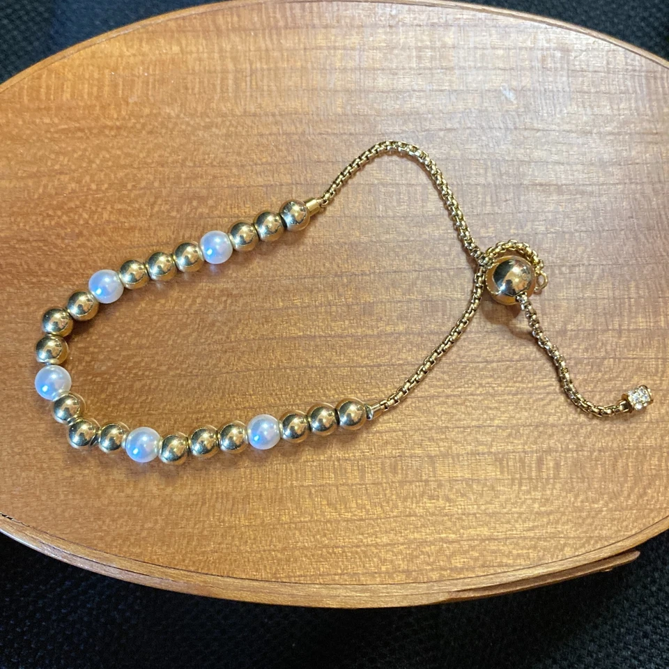 Pulsera Deslizante Michael Kors Ajustable Tono Dorado Cuentas y Perla Imitada Foto 3 de 4