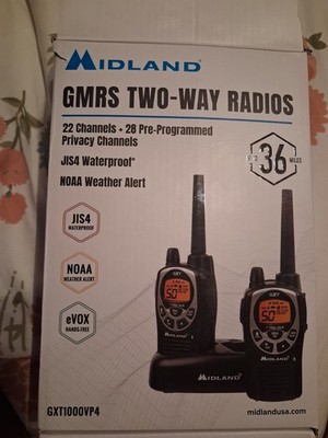 Midland GXT1000VP4 GMRS Walkie Talkie 2-Pack + Headsets and Charger