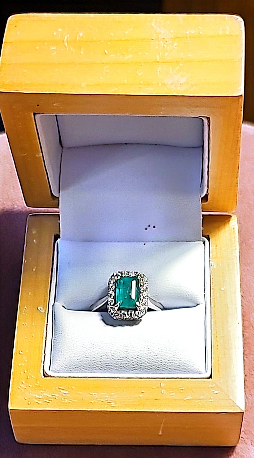 emerald ring with diamond surround