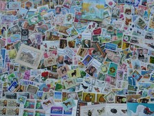 (LOT-VRAC517) 500 beaux timbres neufs **  DU MONDE (photo av. texte)