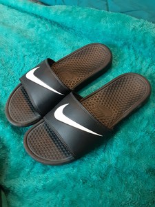 turquoise nike slides