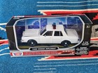 2009 Motormax 1986 Dodge Diplomat Unmarked Police Car 1:24 Scale Diecast
