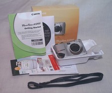 CANON POWERSHOT A1200 12.1 mp COMPACT DIGITAL CAMERA IN OB W/ PAPERS