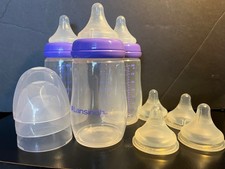 Lansinoh 8 oz bottles with 7 fast flow nipples