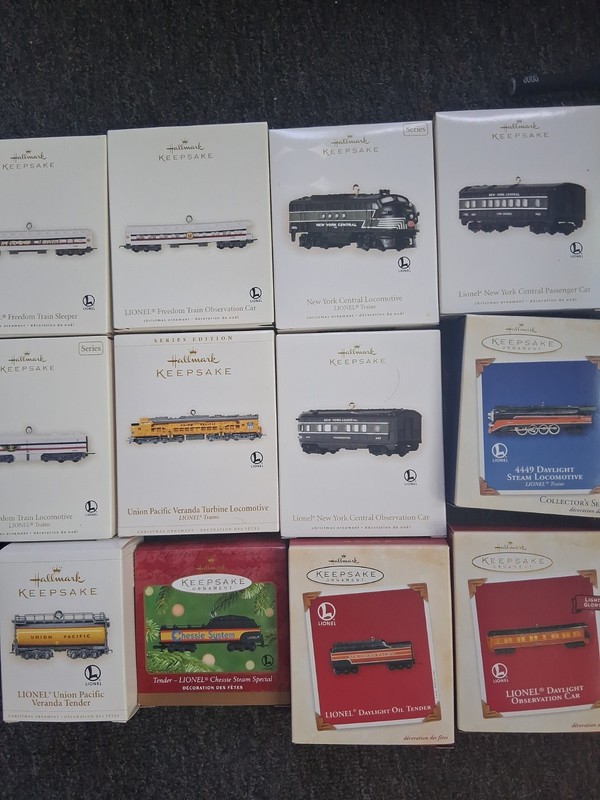  Lot of 12  Hallmark Keepsake LIONEL Christmas Ornaments