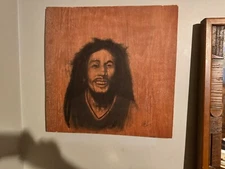 One of a Kind Hand Drawn Charcoal Bob Marley drawing on wooden base and signed 