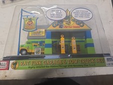 AUTO WORLD RAT FINK GARAGE TWO TRUCK SET NEW SEALED 1;32 SCALE
